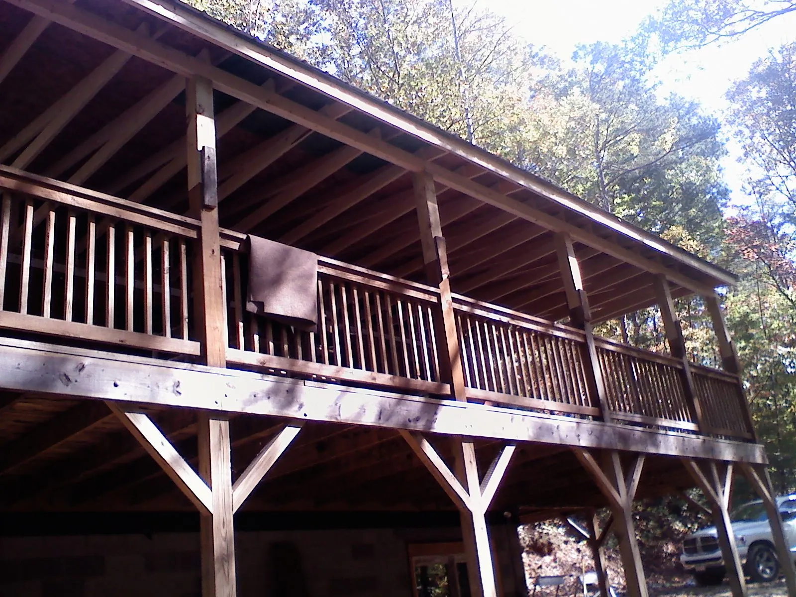 Timber framing under a new elevated porch and deck — Roof Leak Repair in Mashantucket by Roofing Brothers